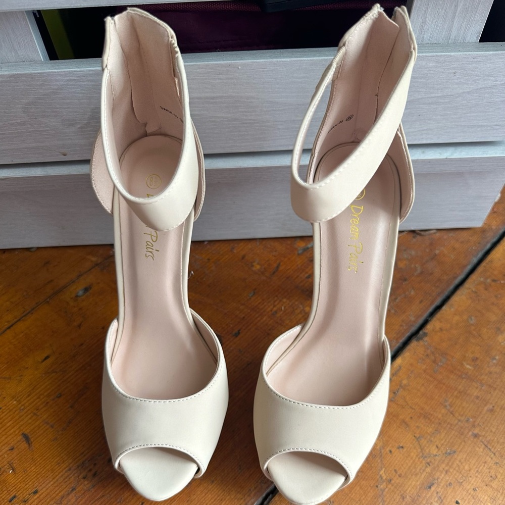 Size 8 1/2 heels - Brand new without box.